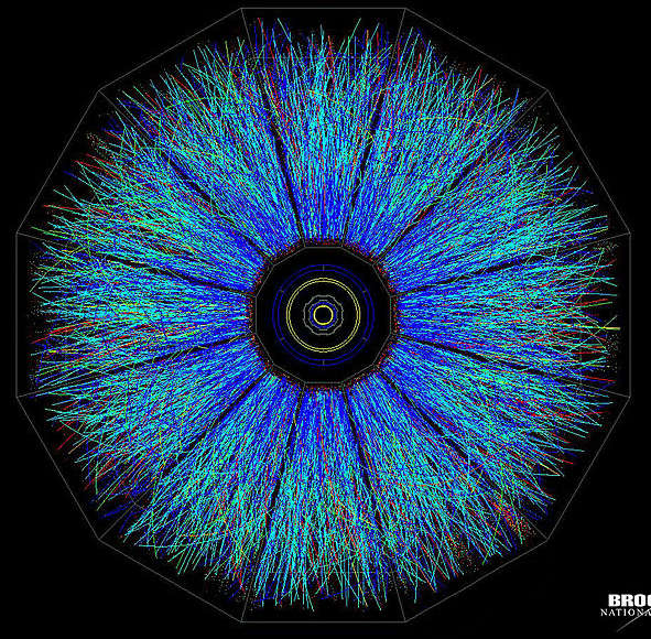 A view of one of the first full-energy collisions between gold ions at Brookhaven National Laboratory's Relativistic Heavy Ion Collider, as captured by the Solenoidal Tracker At RHIC (STAR) detector. The tracks indicate the paths taken by thousands of subatomic particles produced in the collisions as they pass through the STAR Time Projection Chamber, a large, 3-D digital camera.
