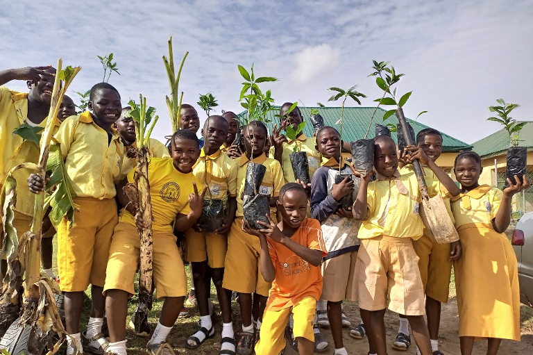 schoolchildren planting trees