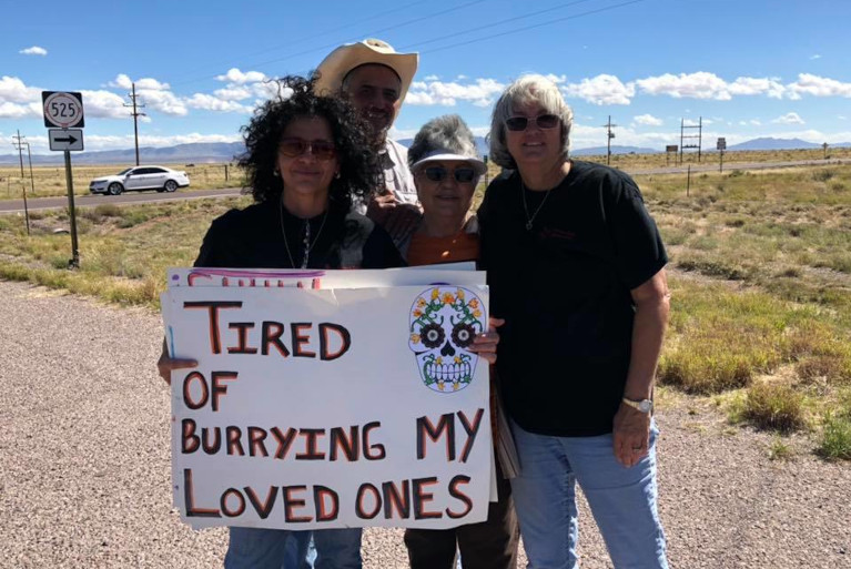 Tina Cordova (left) demonstrating near the Trinity test site in 2018. (Facebook/Tularosa Basin Downwinders Consortium)