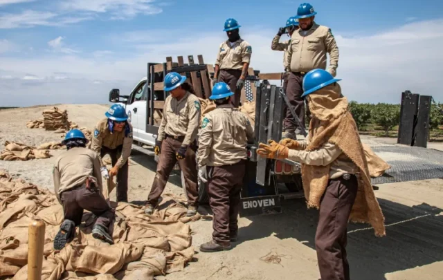California Conservation Corps building levee