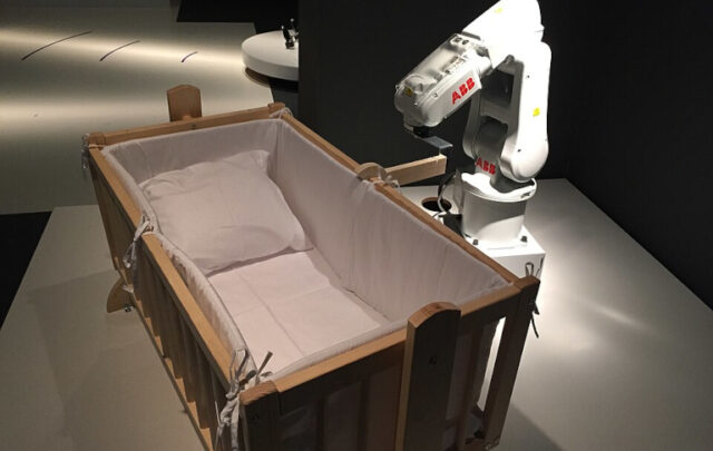 Robot looking at bed